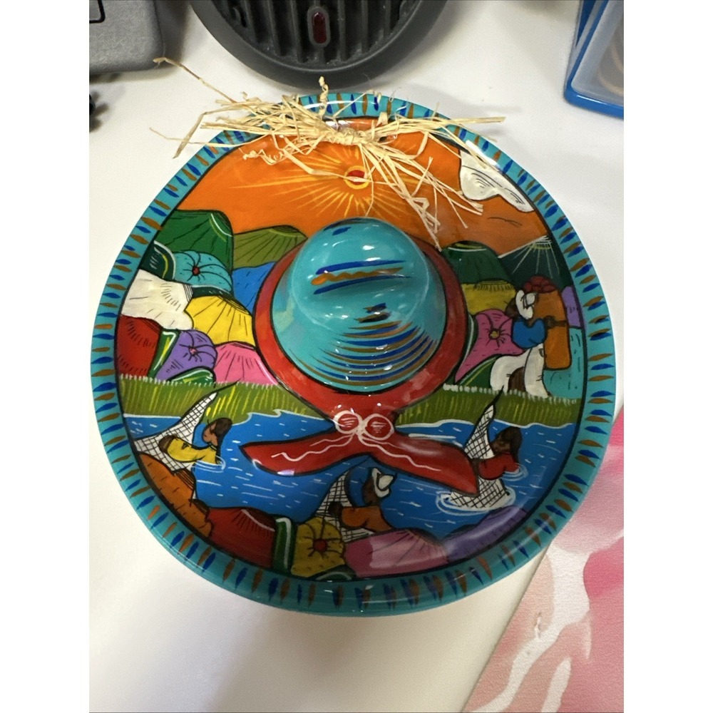 Signed Mexican pottery bowl shaped like a traditional sombrero.  7x7